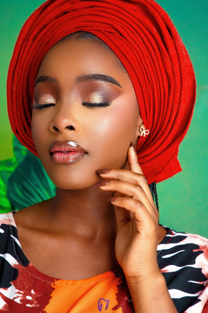 Hand at chin, eyes closed